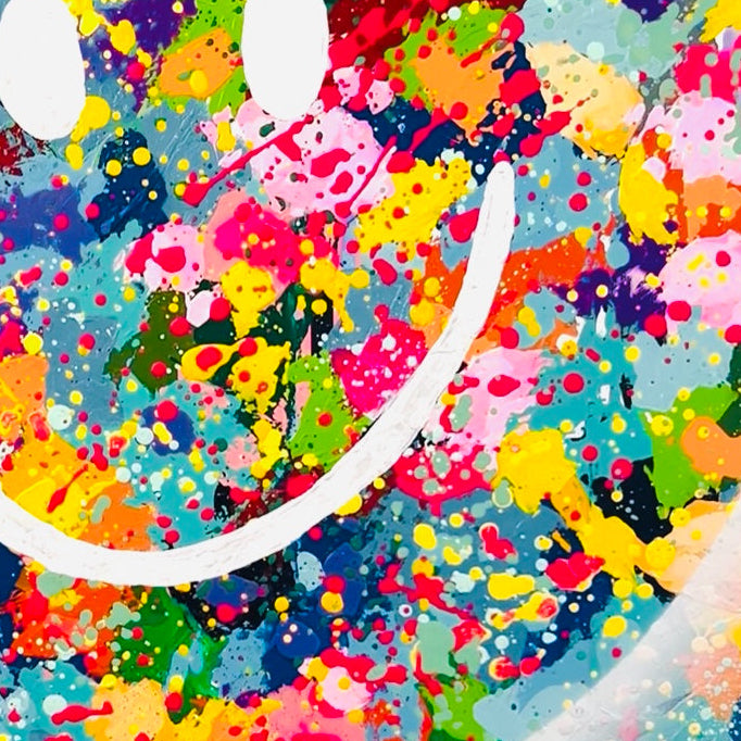 Colorful abstract painting with a smiley face design
