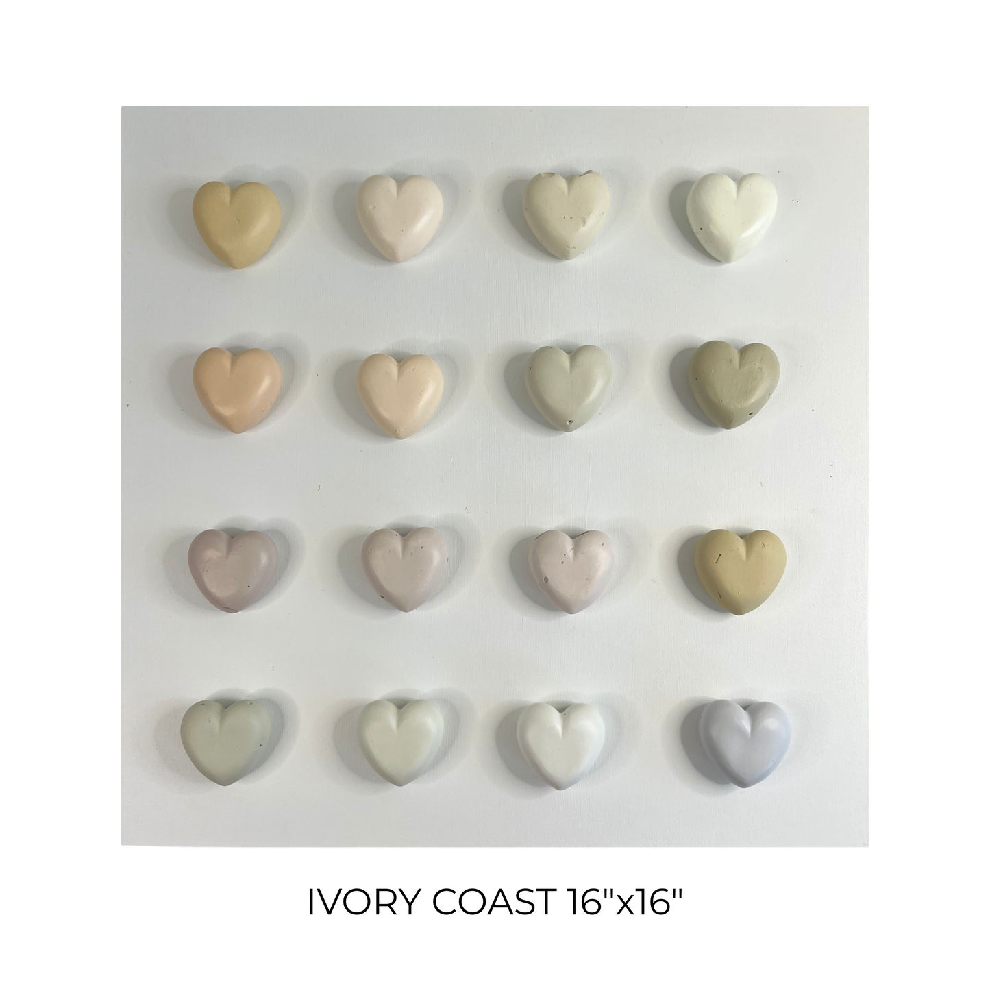 Heart-shaped ceramic tiles in ivory color on a white background