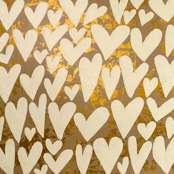 Abstract art piece with heart pattern on gold and striped blue and white design