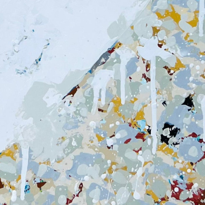 Abstract art with splashes of color on a light blue background