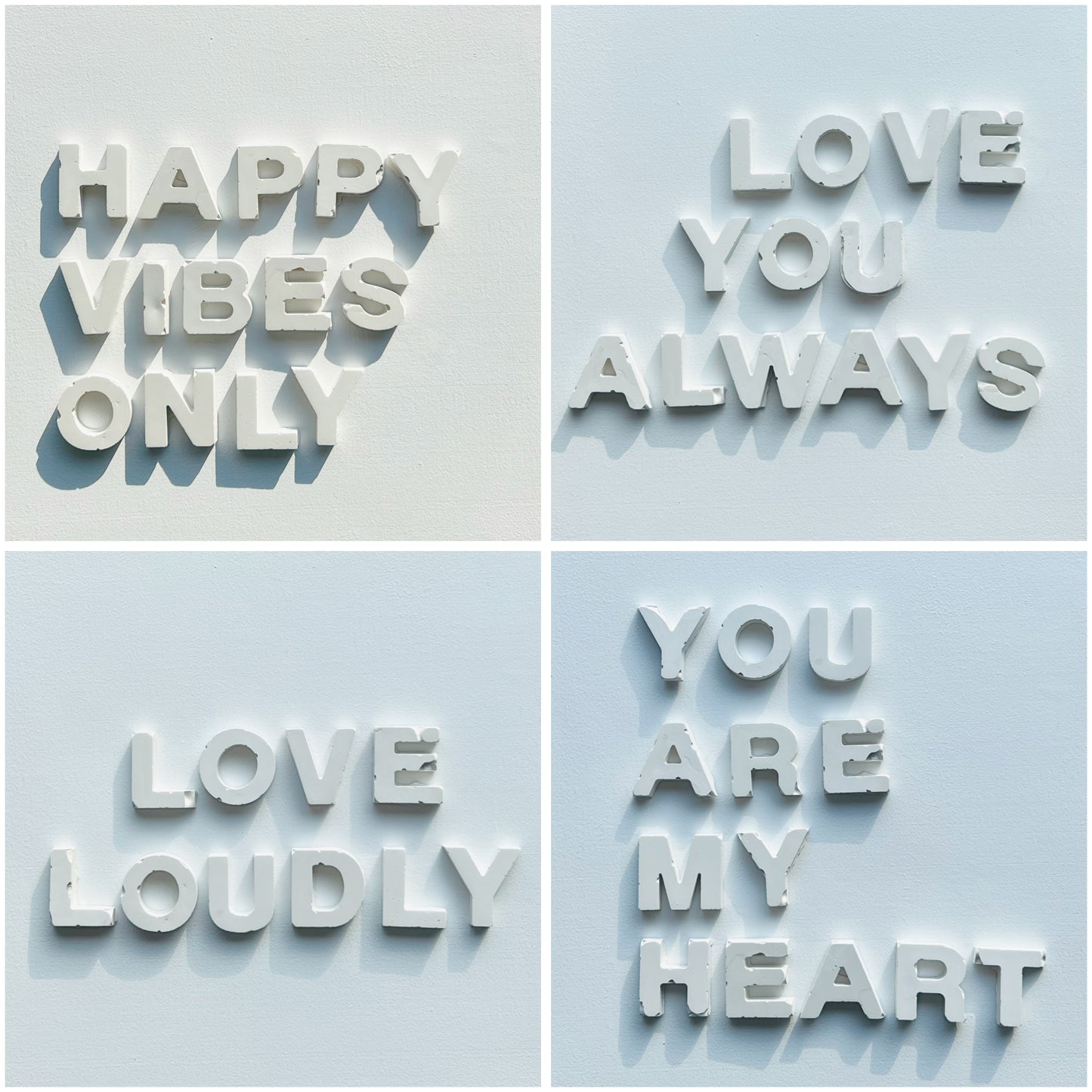 Four motivational phrases on a light blue background