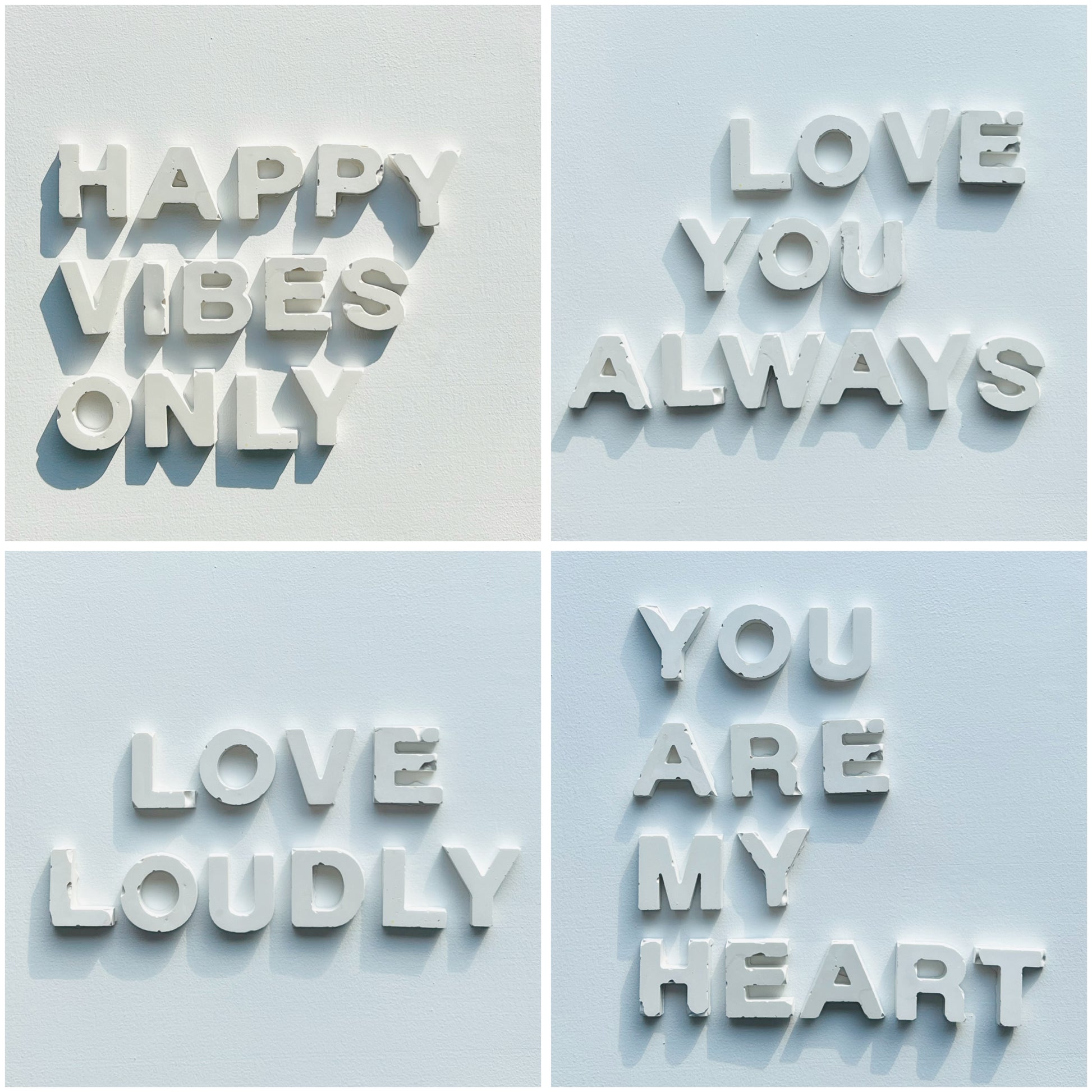 Four motivational phrases on a light blue background