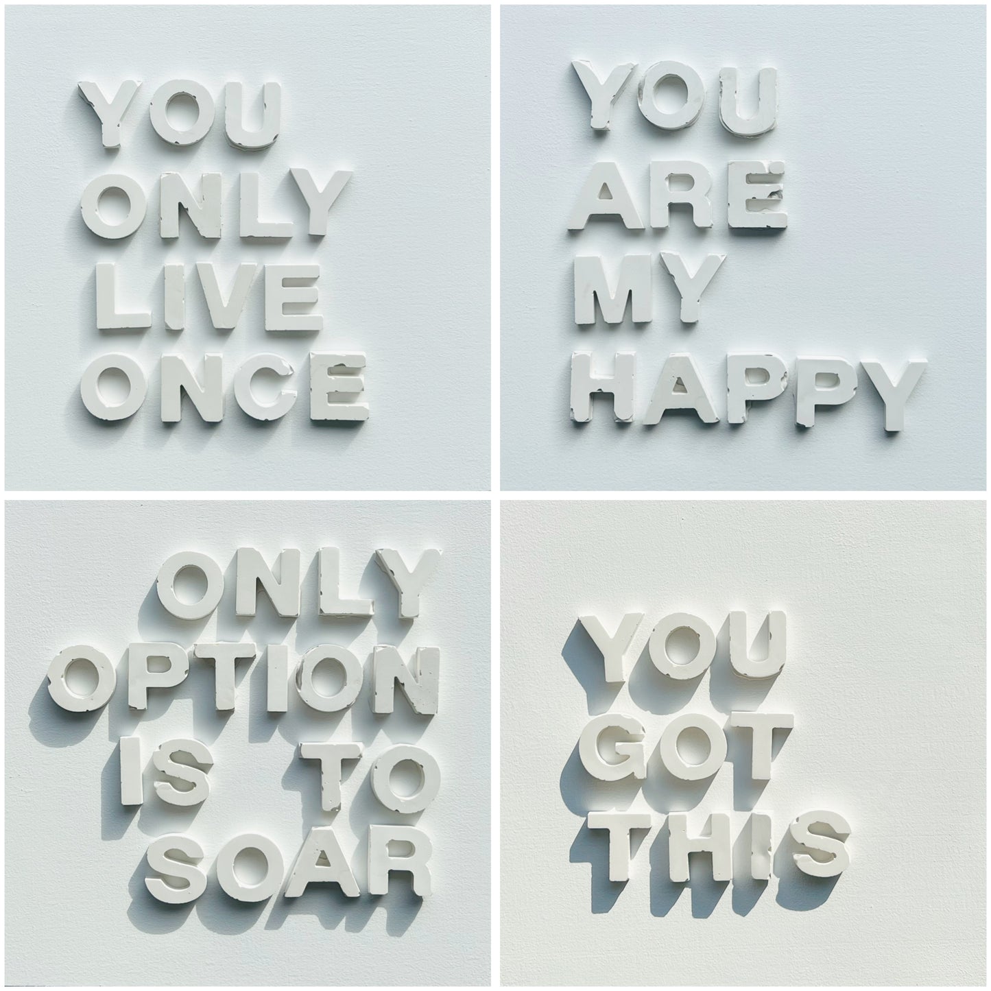 Four motivational phrases on a light blue background