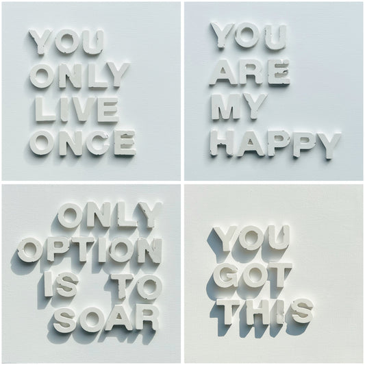 Four motivational phrases on a light blue background