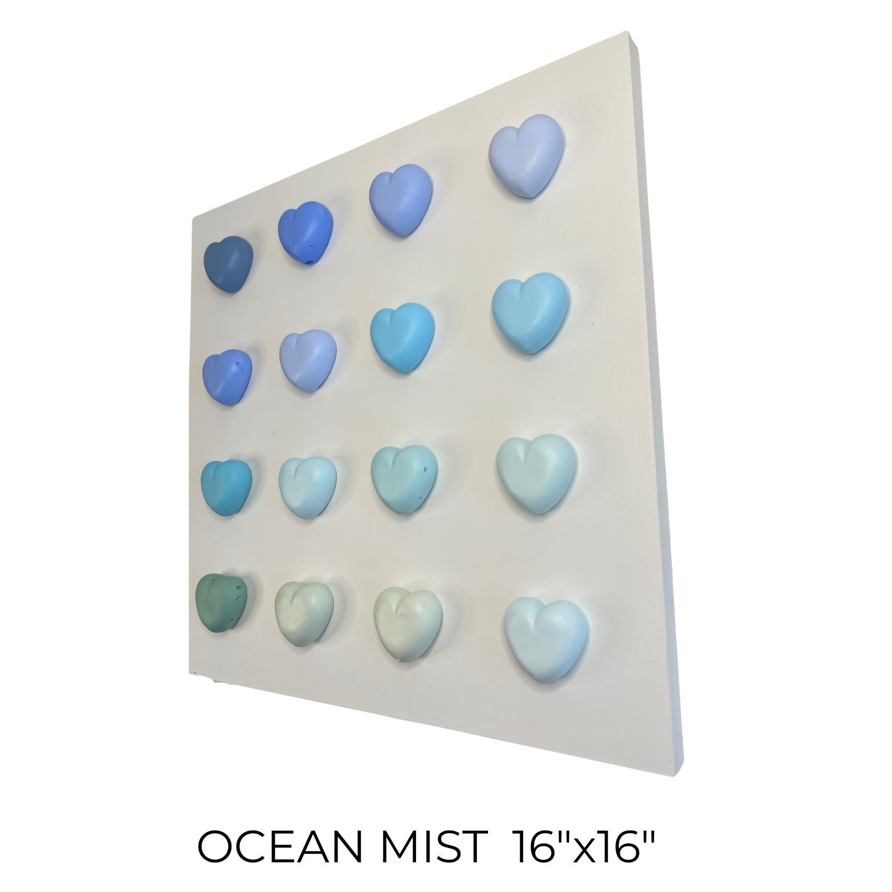 Decorative wall art with heart shapes in ocean mist colors on a white background