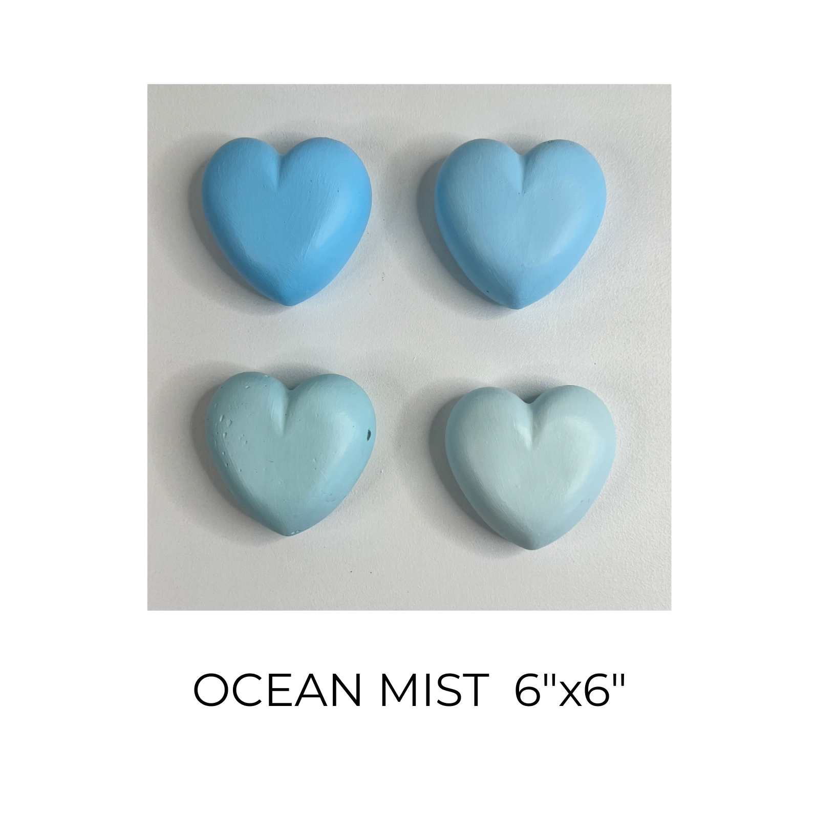 Four blue heart-shaped objects on a white background with 'Ocean Mist 6"x6"' text.