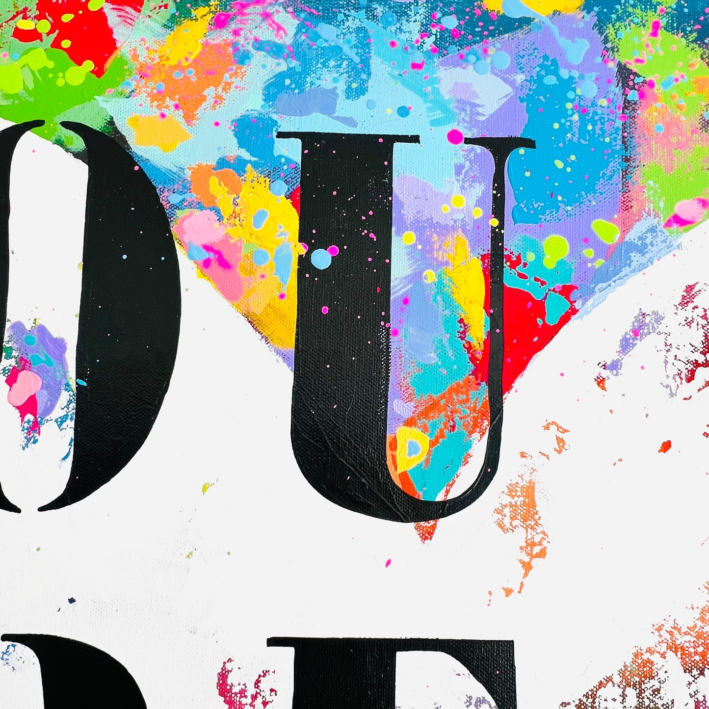 Colorful abstract design with the word 'DURE' in black letters.