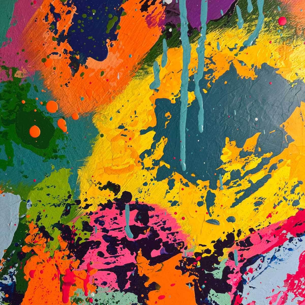 Abstract multicolor paint splatter and drip artwork with bold strokes of orange, yellow, pink, teal, green, black, and blue.