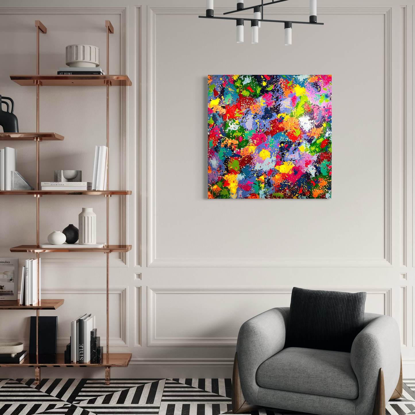 Modern living room with a colorful abstract painting on the wall, gray armchair, and wooden shelves.