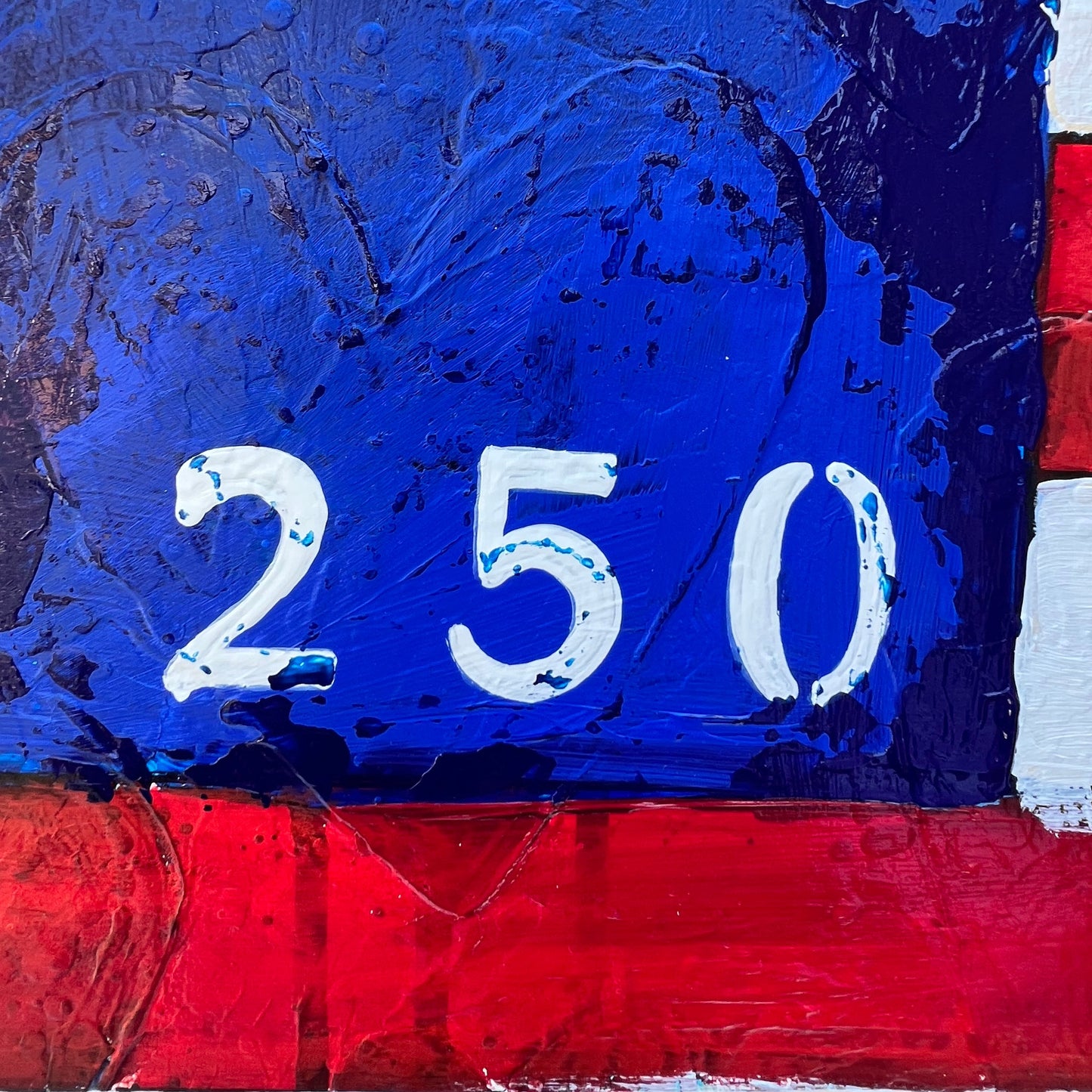 Abstract artwork with blue, red, and white colors