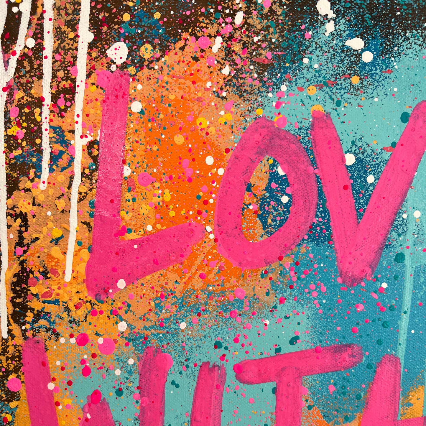 Colorful abstract art with pink text on a multicolored background