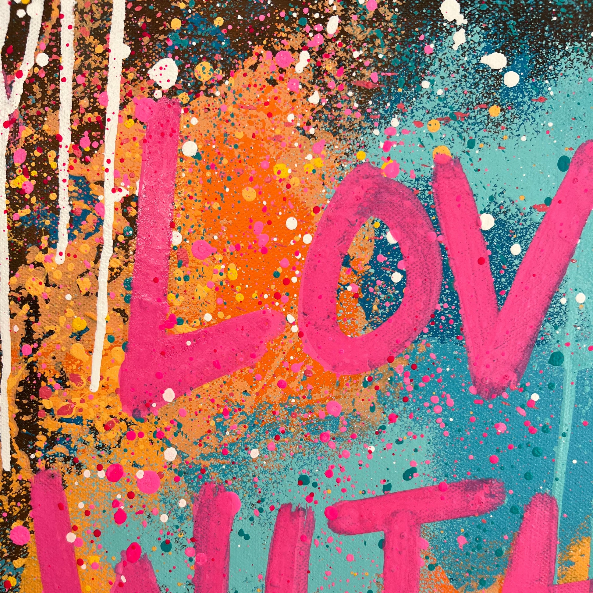 Colorful abstract art with pink text on a multicolored background