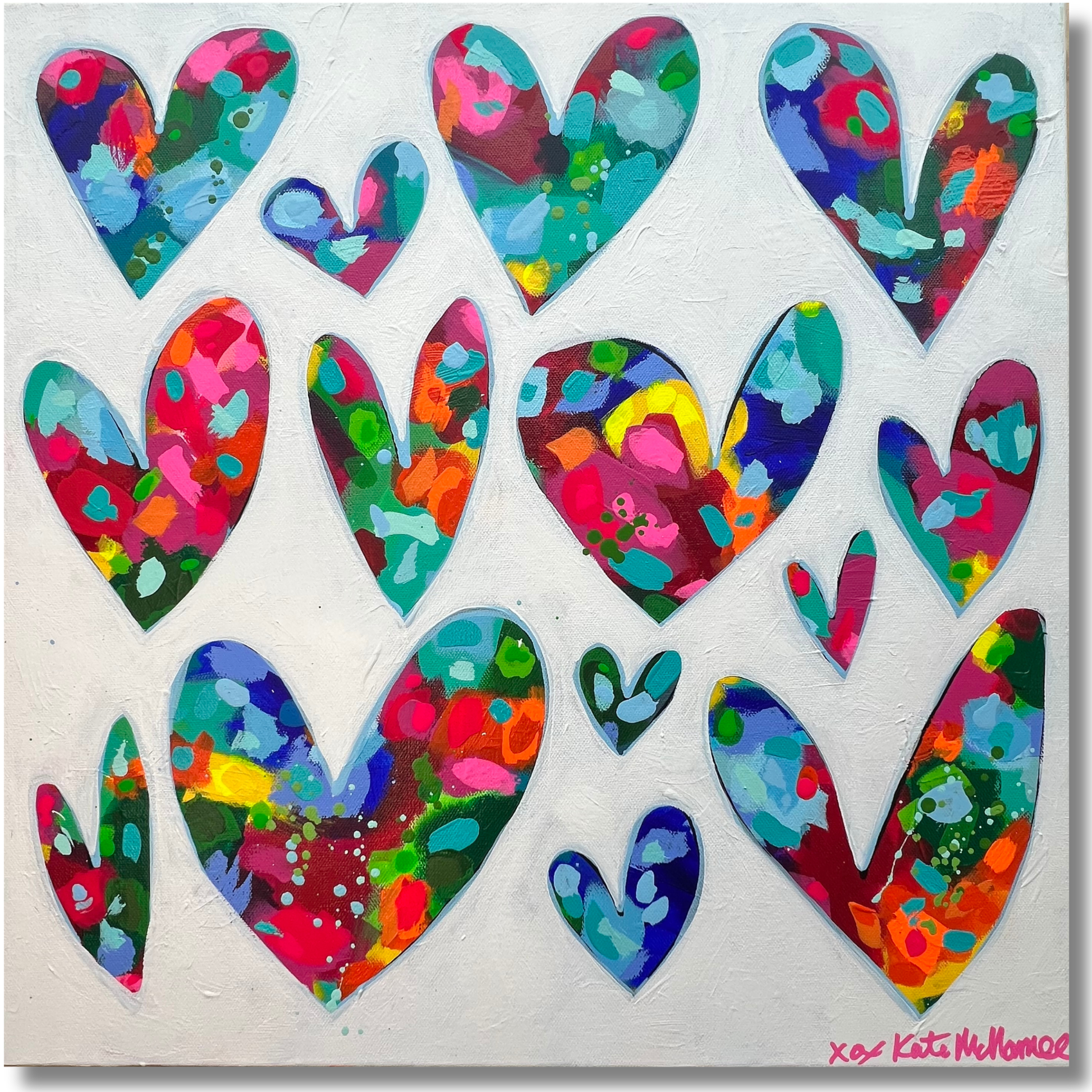 Colorful heart-shaped stickers on a white background
