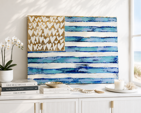 Abstract art piece with heart pattern on gold and striped blue and white design